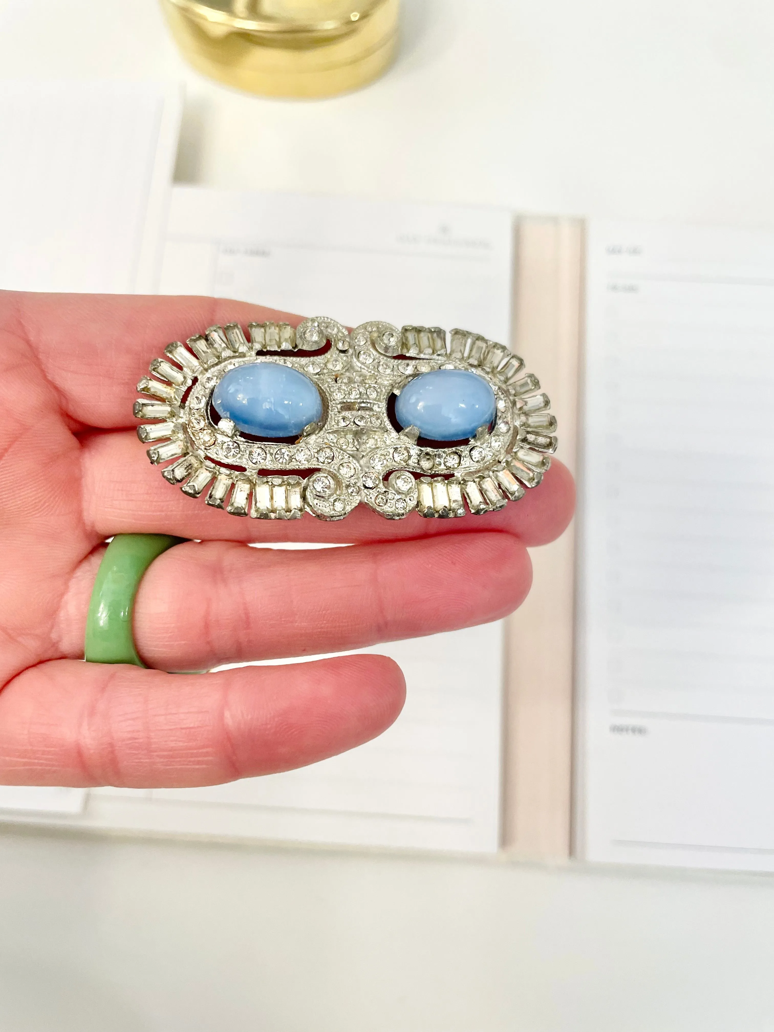 1940's stunning deco style brooch... I adore the blue moon glow glass stones.