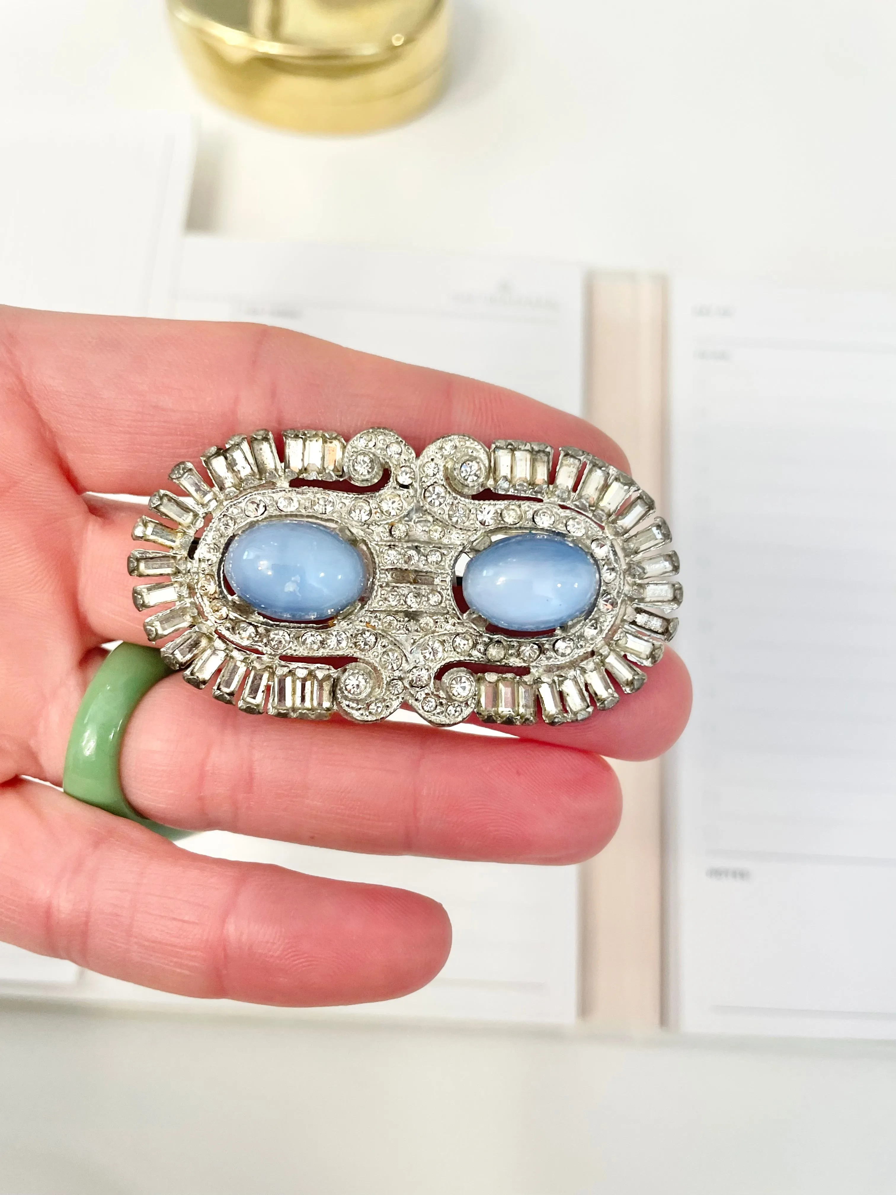 1940's stunning deco style brooch... I adore the blue moon glow glass stones.