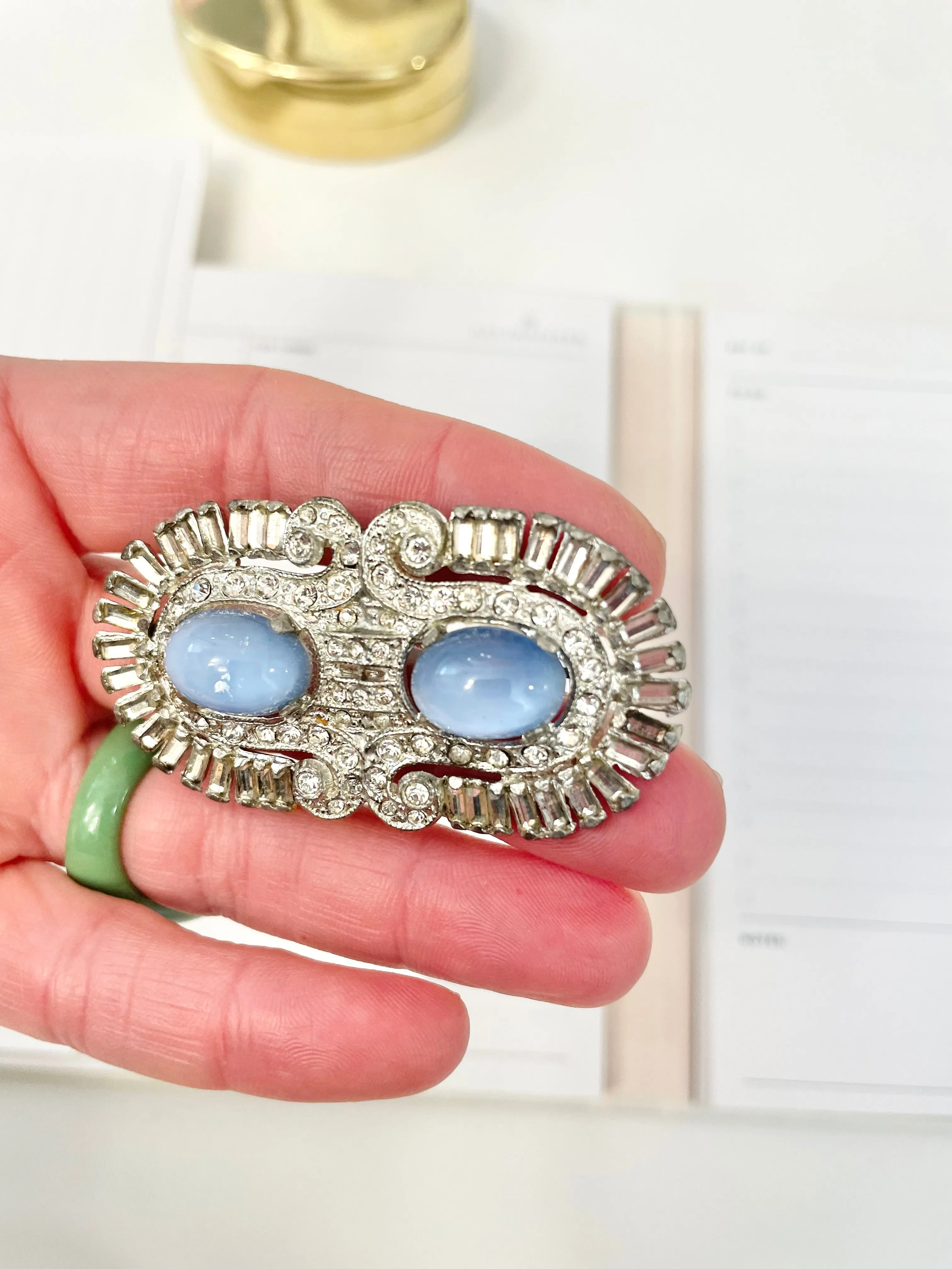 1940's stunning deco style brooch... I adore the blue moon glow glass stones.