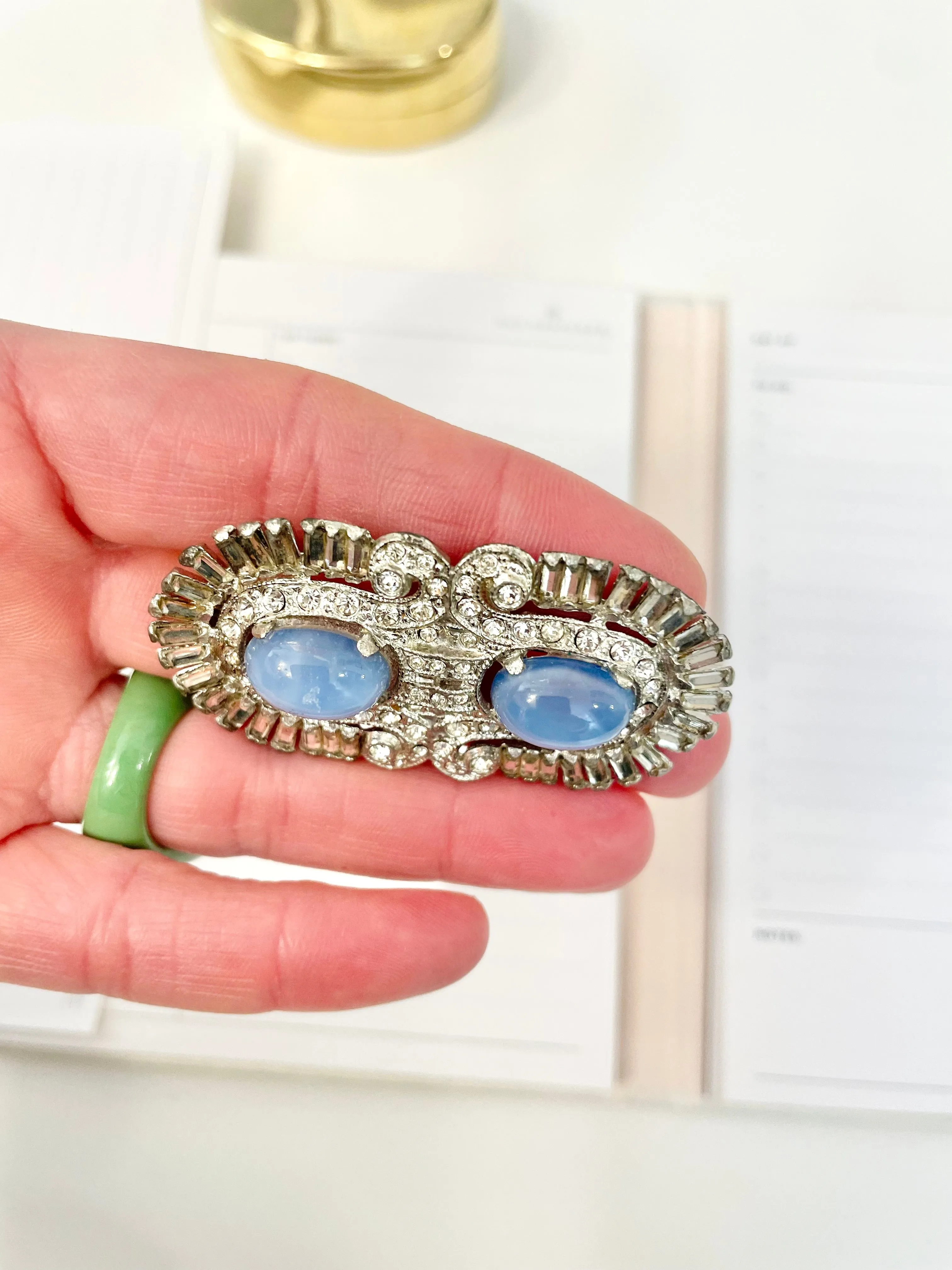 1940's stunning deco style brooch... I adore the blue moon glow glass stones.