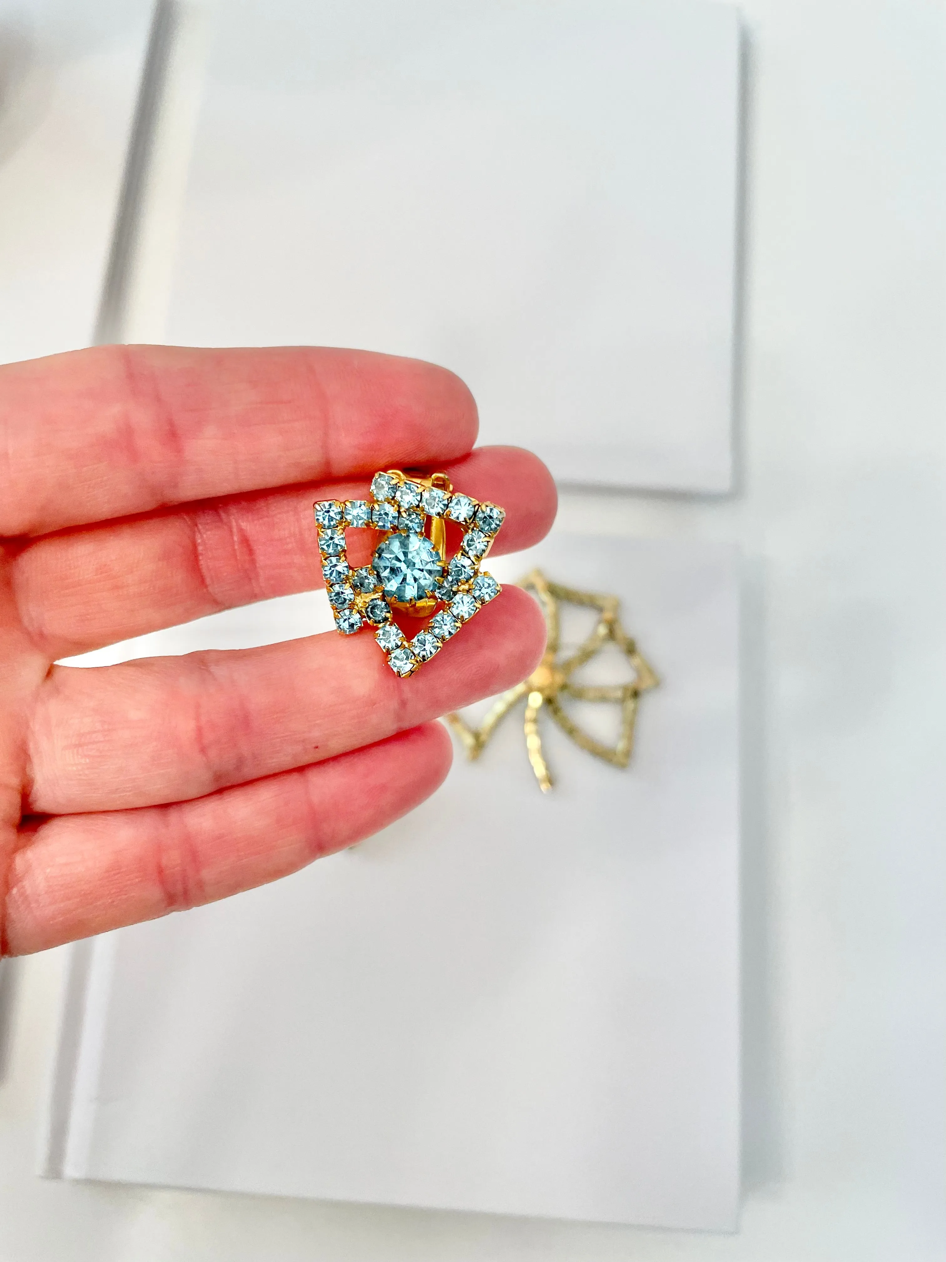 1960's Heiress and her love of a classy brooch set. This aqua glass brooch and earrings are truly divine.