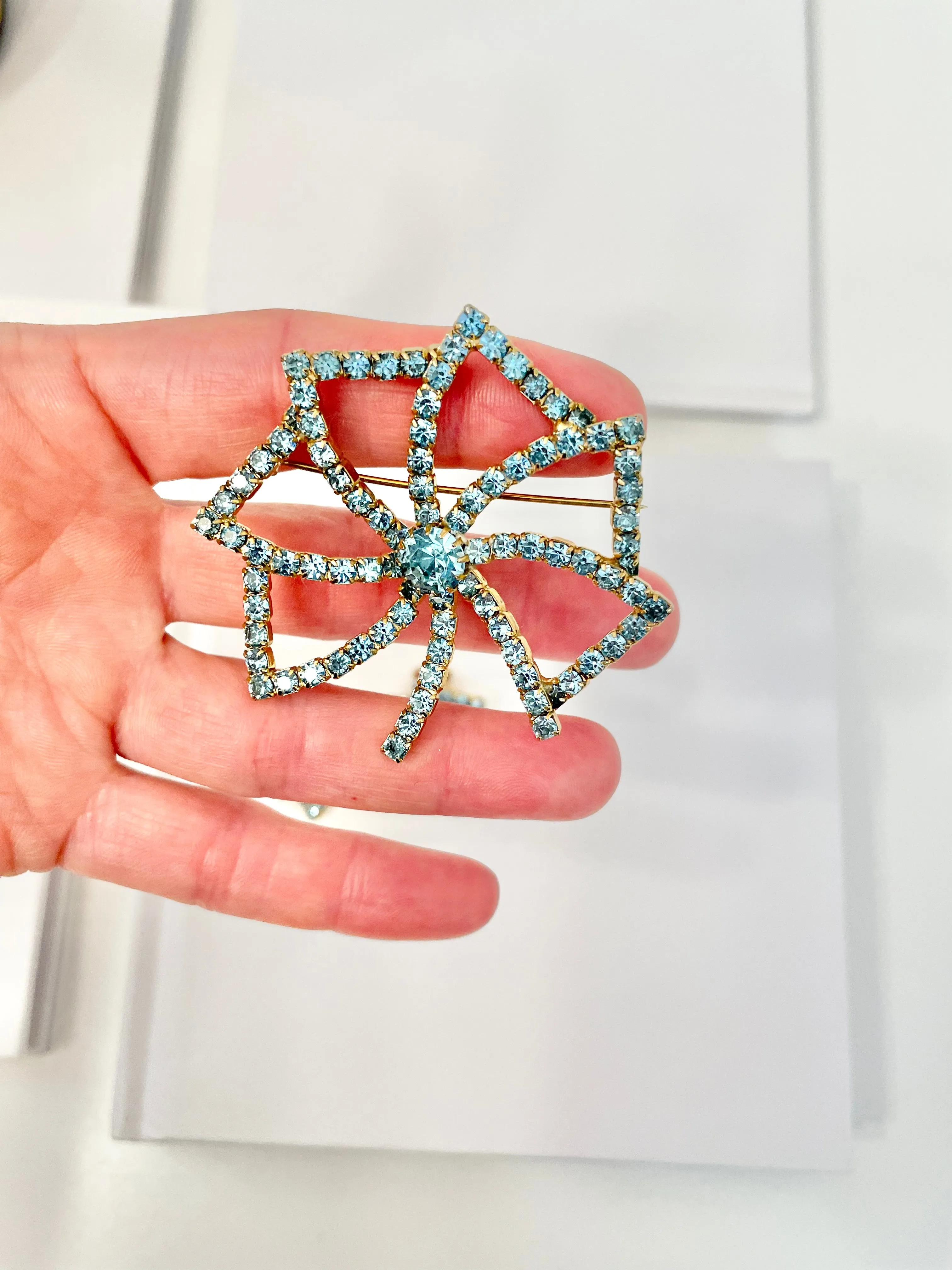 1960's Heiress and her love of a classy brooch set. This aqua glass brooch and earrings are truly divine.