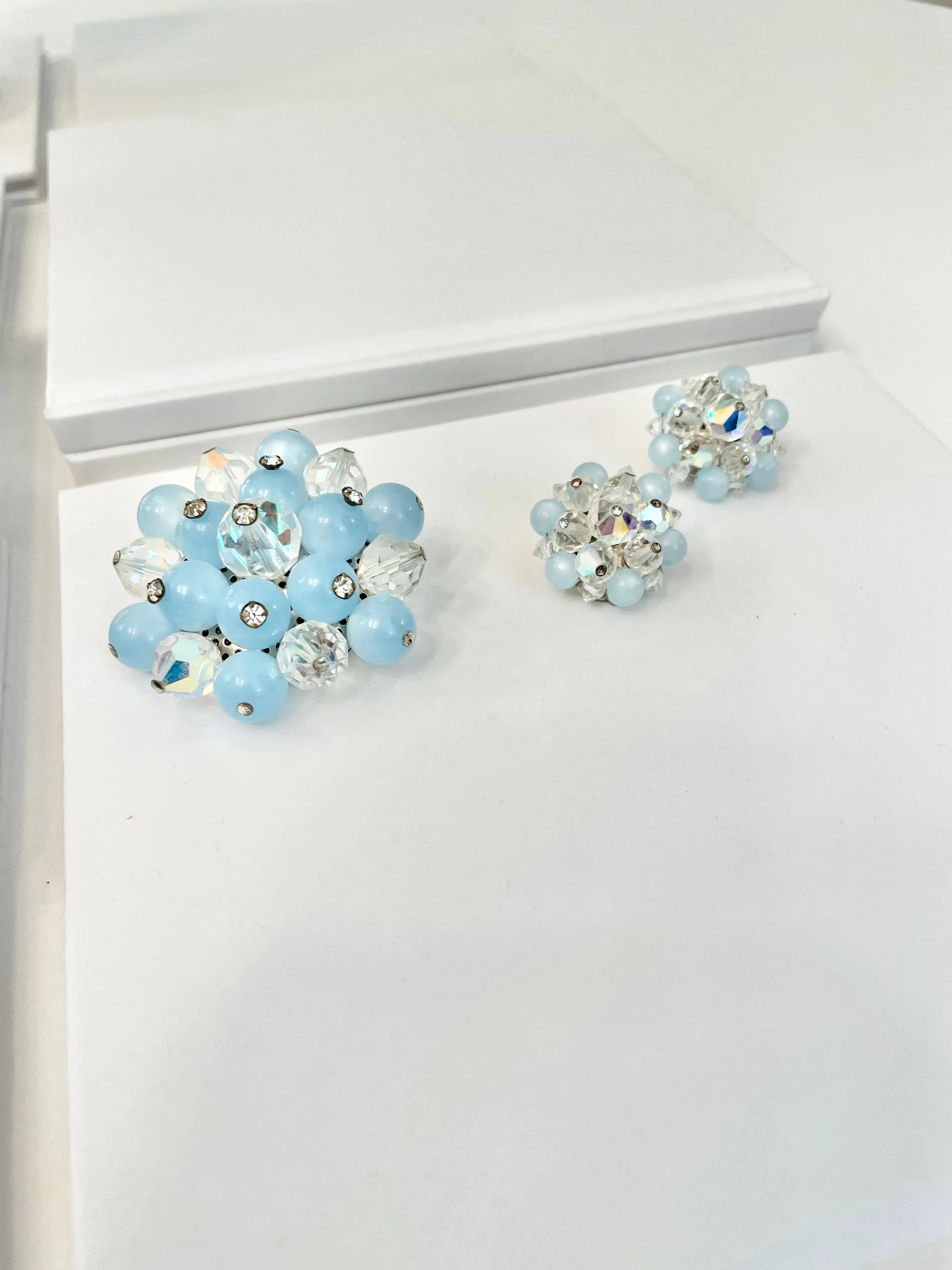 1960's Heiress and her love of the classic brooch, and matching earrings. Oh my! The soft blue with Austrian crystals is truly divine.