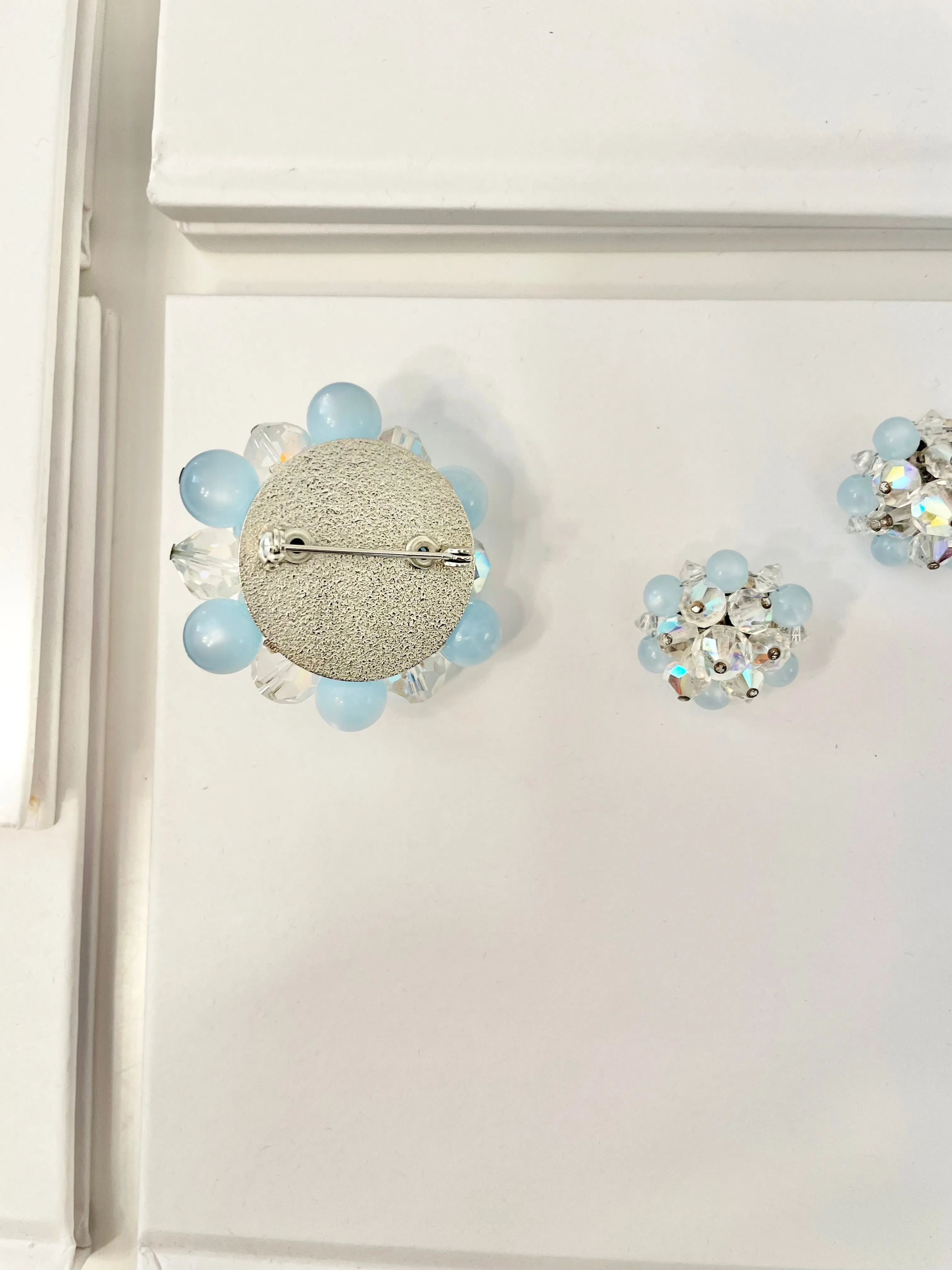 1960's Heiress and her love of the classic brooch, and matching earrings. Oh my! The soft blue with Austrian crystals is truly divine.