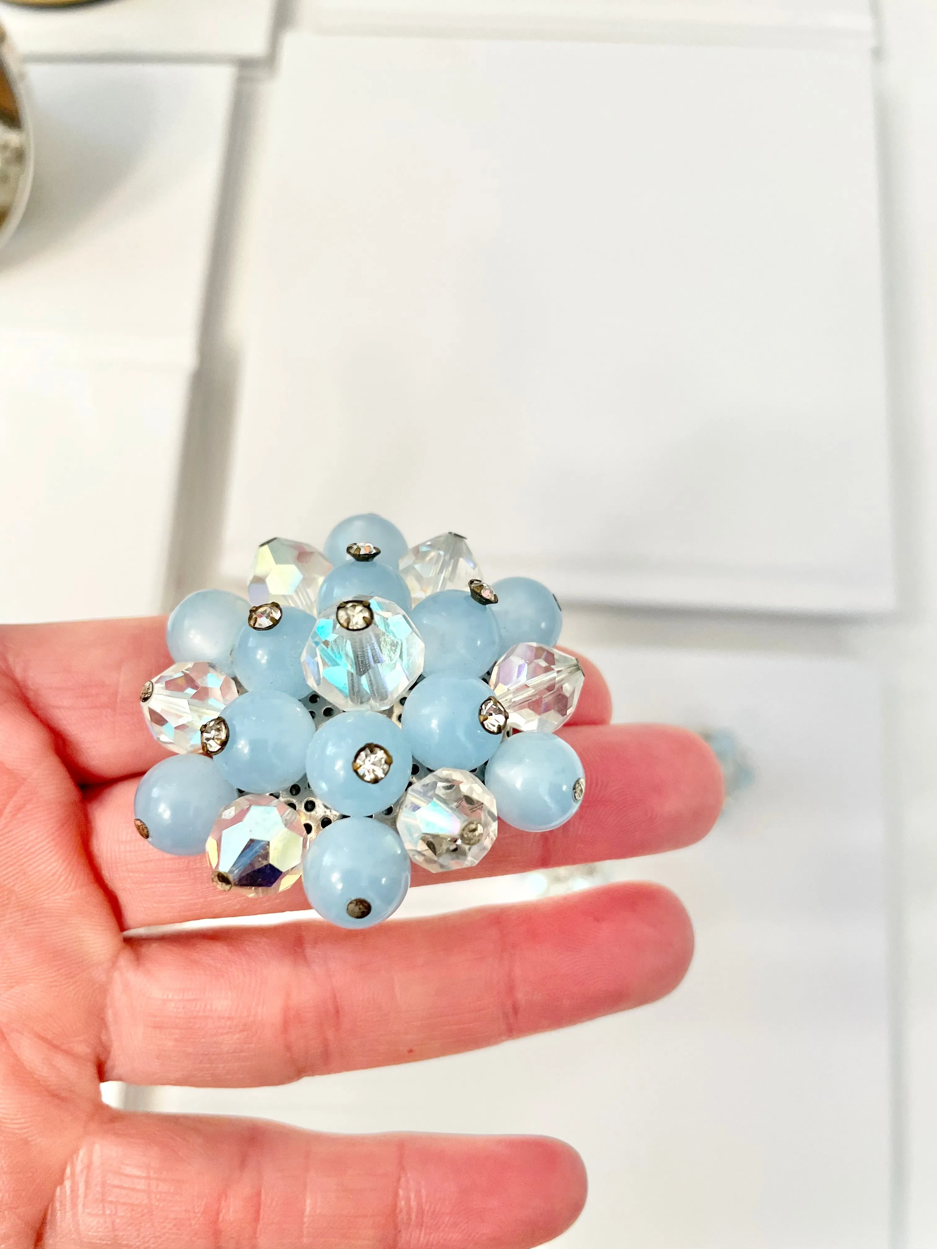 1960's Heiress and her love of the classic brooch, and matching earrings. Oh my! The soft blue with Austrian crystals is truly divine.